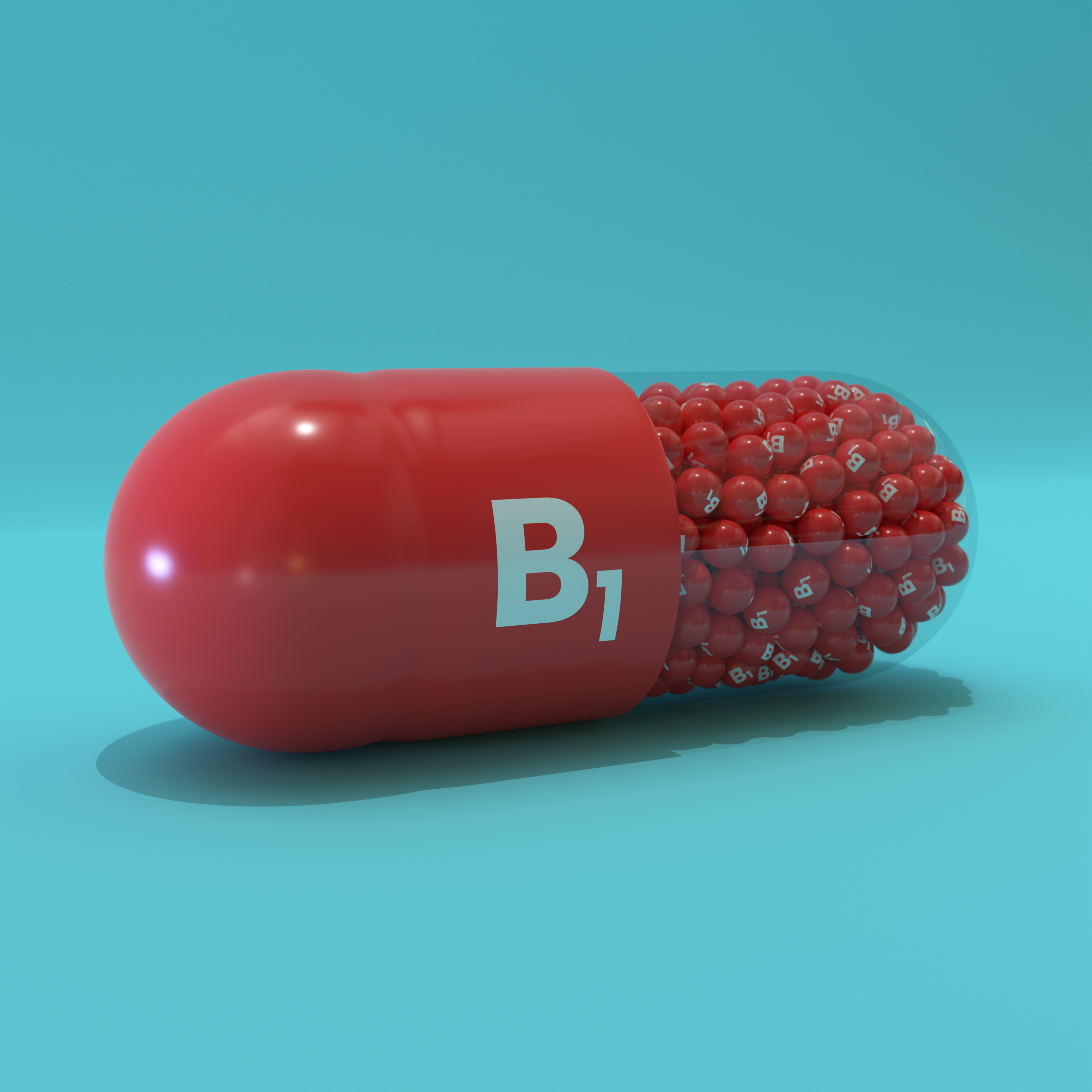Vitamin B1 With Red Capsule, Granules and Turqoise Background