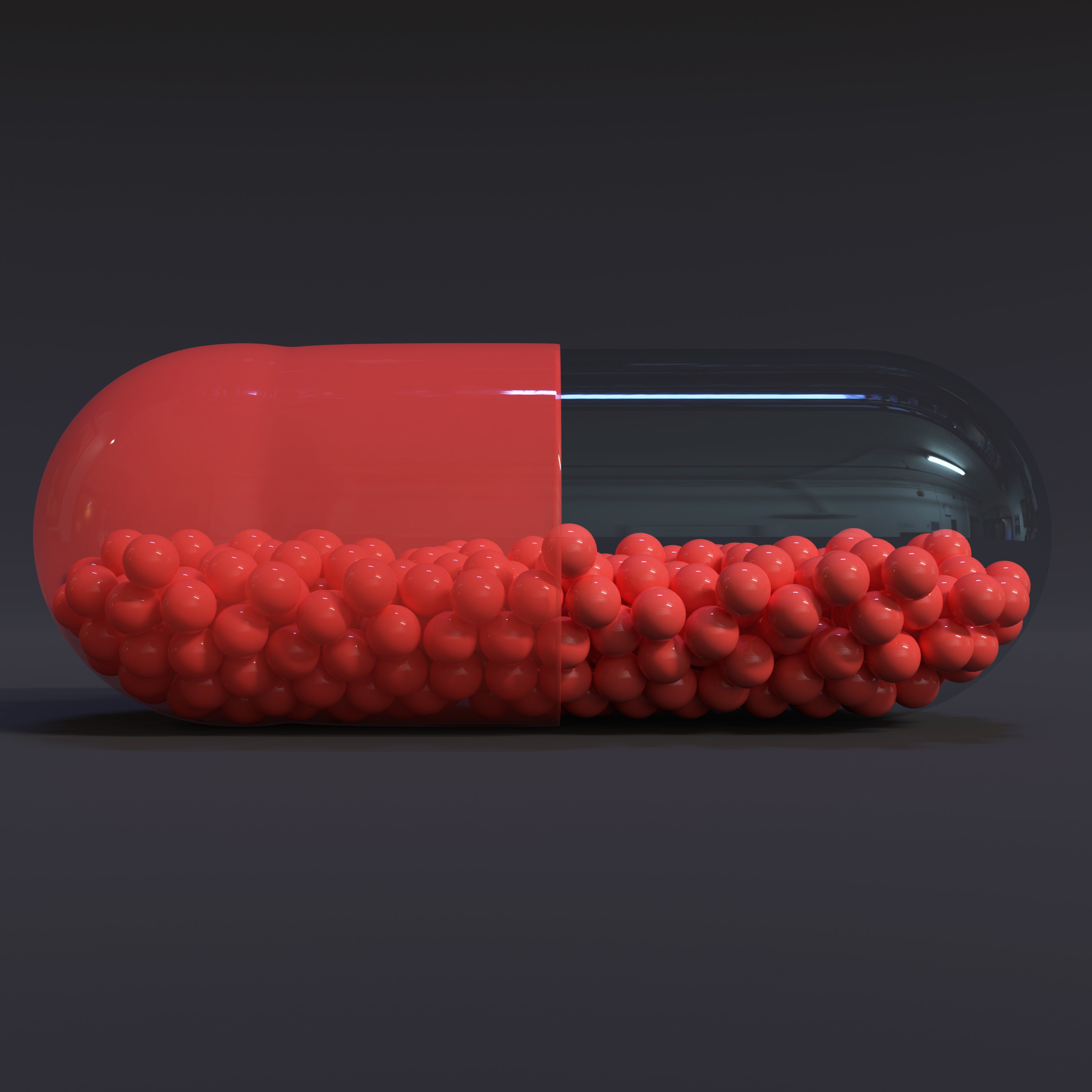 Transparent Red Capsule With Granules With Dark Background