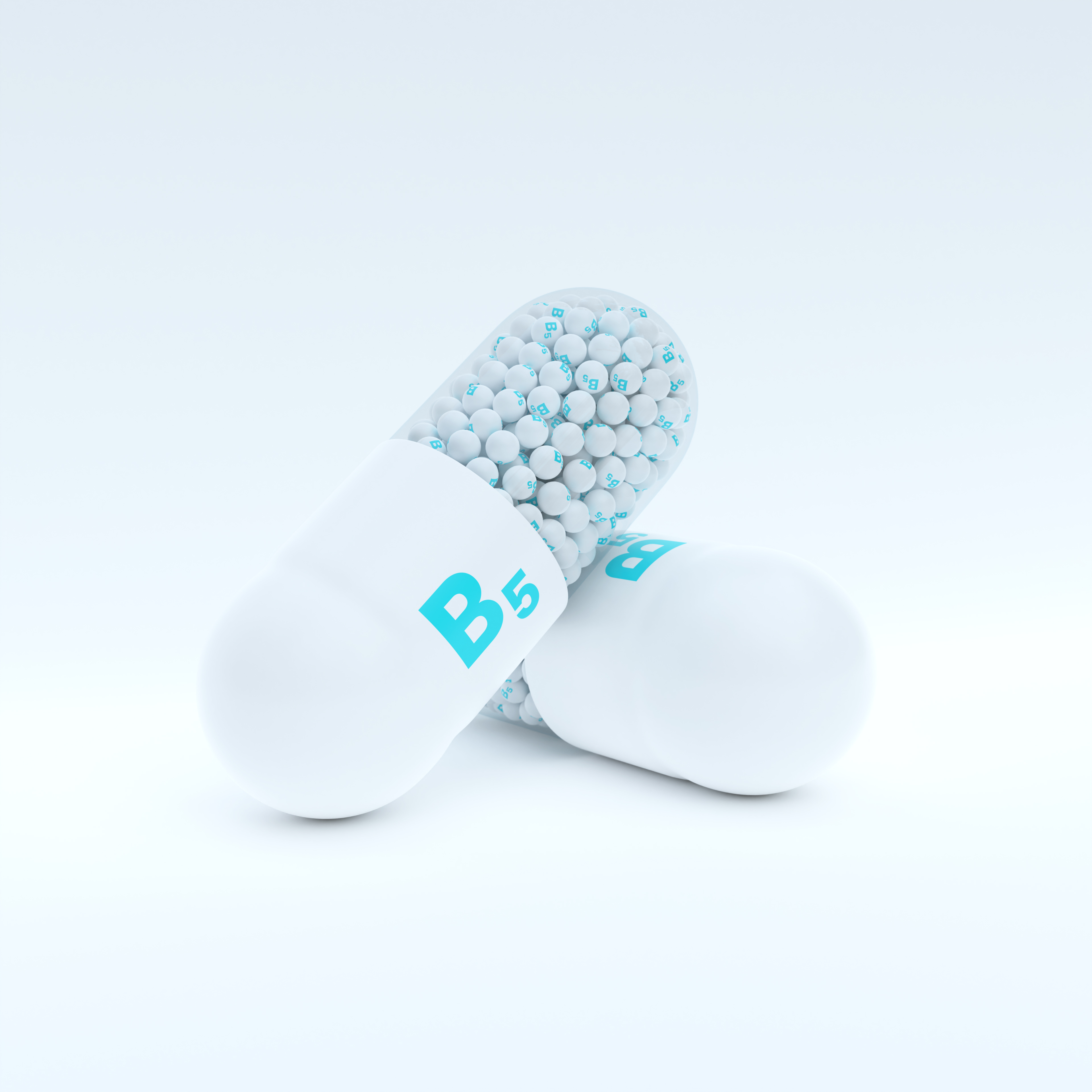 Vitamin B5 With White, Turqoise Capsule, Granules and Whtie Background