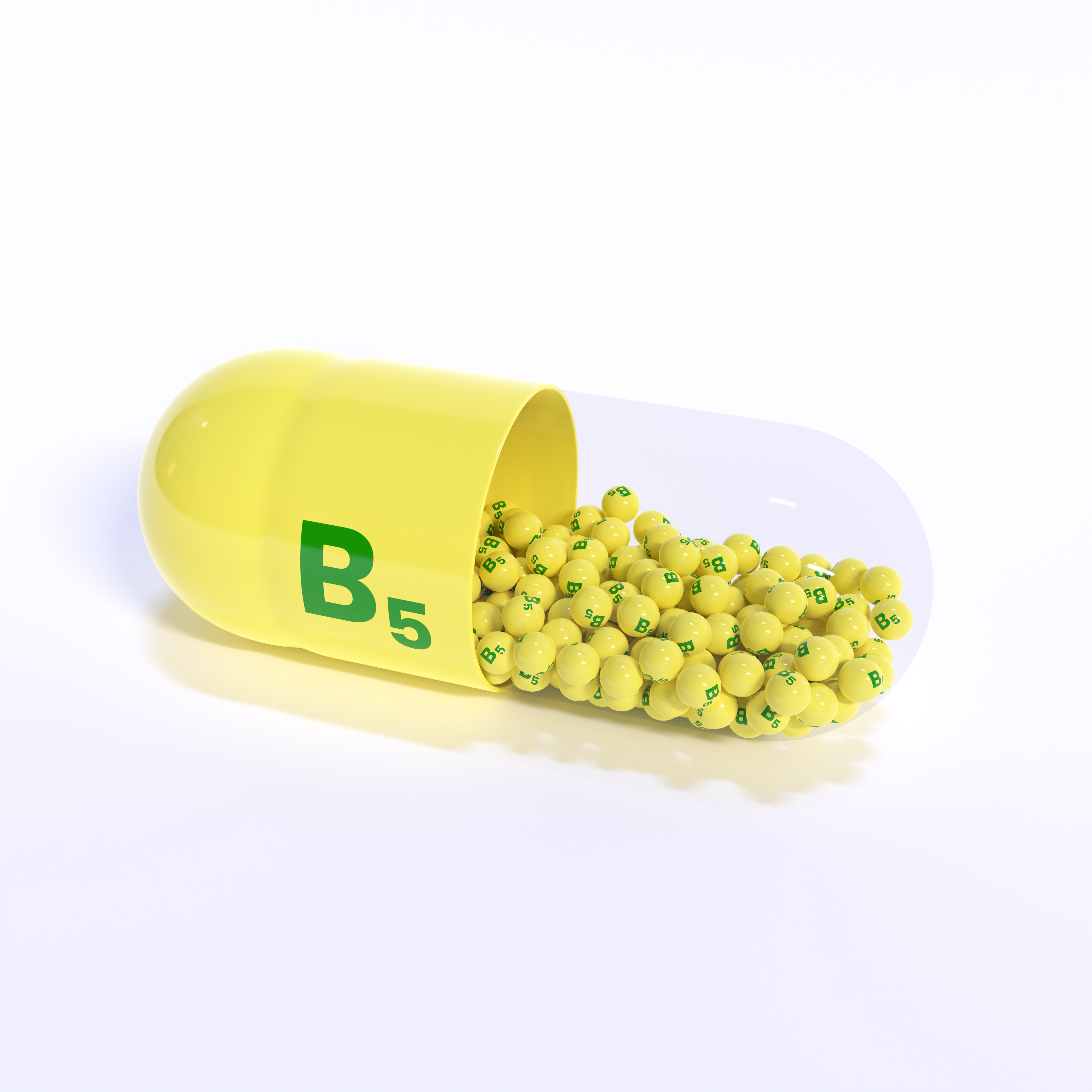 Vitamin B5 With Yellow Capsule, Granules and White Background