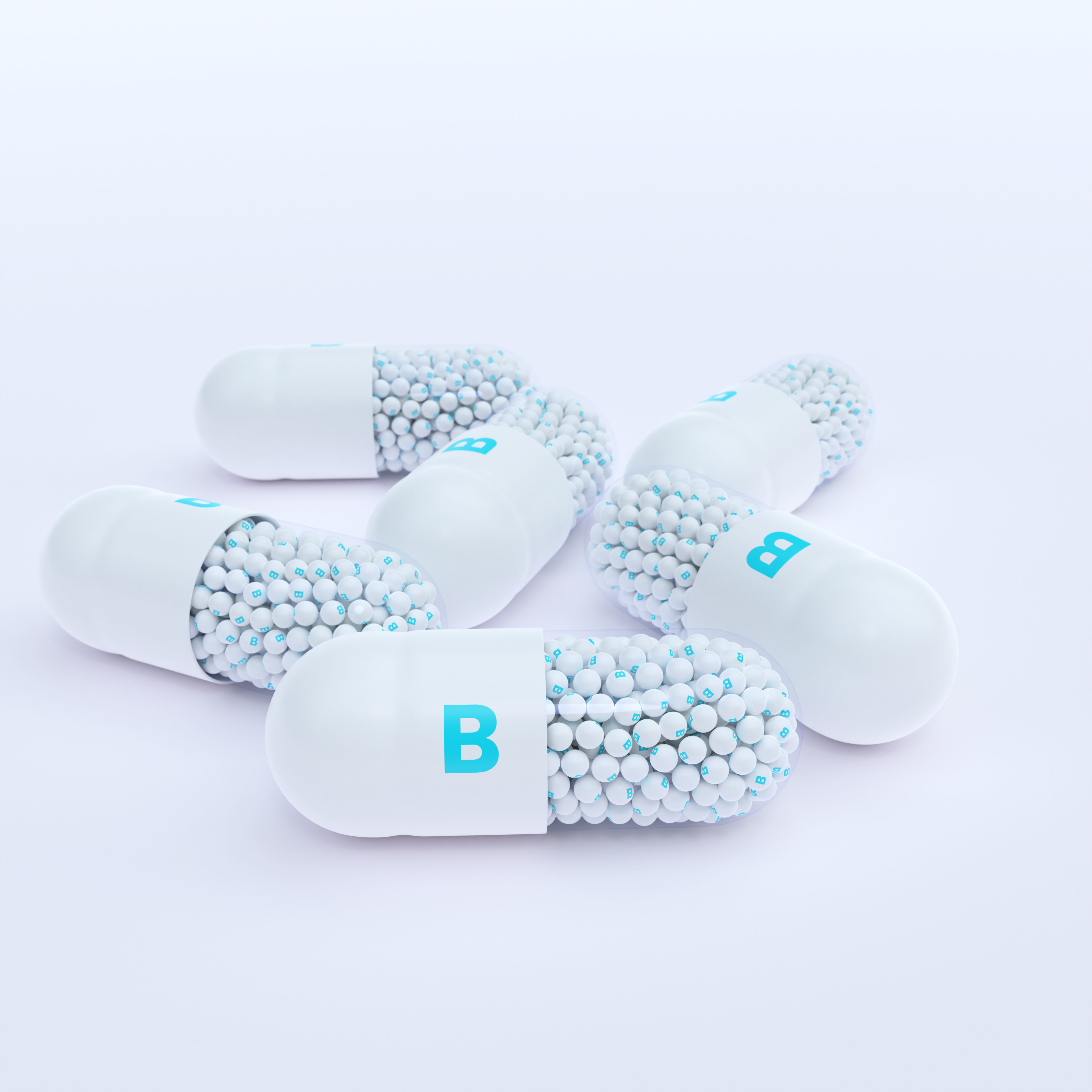 Vitamin B With White Capsules, Granules and White Background