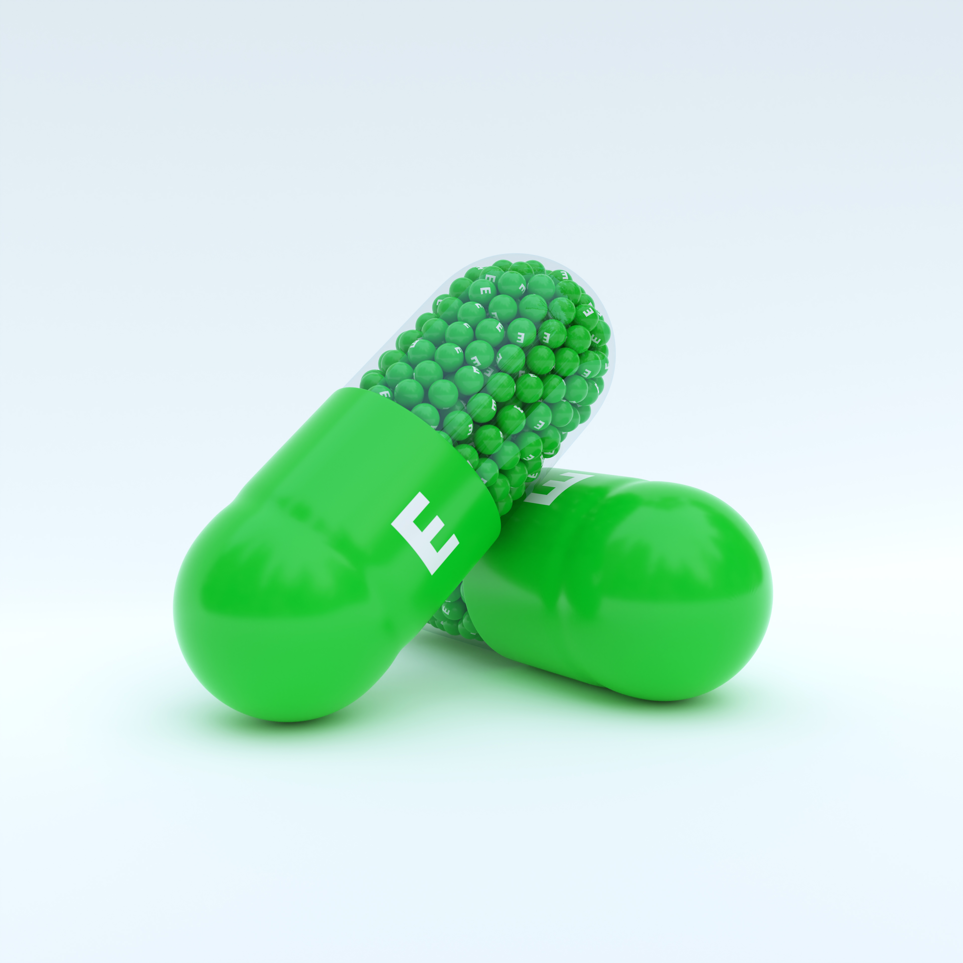 Vitamin E With Green Capsule, Granules and White Background