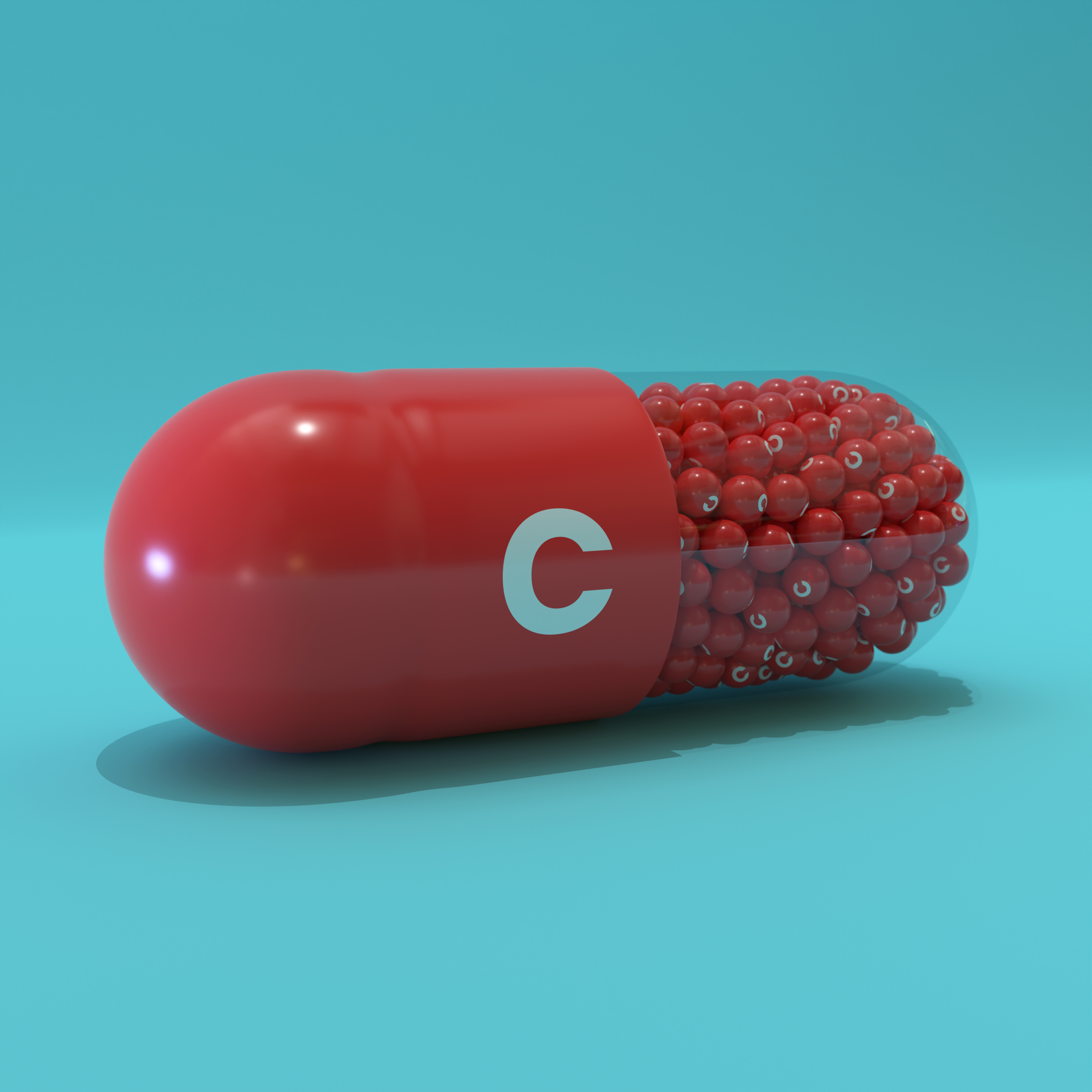 Vitamin C With Red Capsule, Granules and Turqoise Background