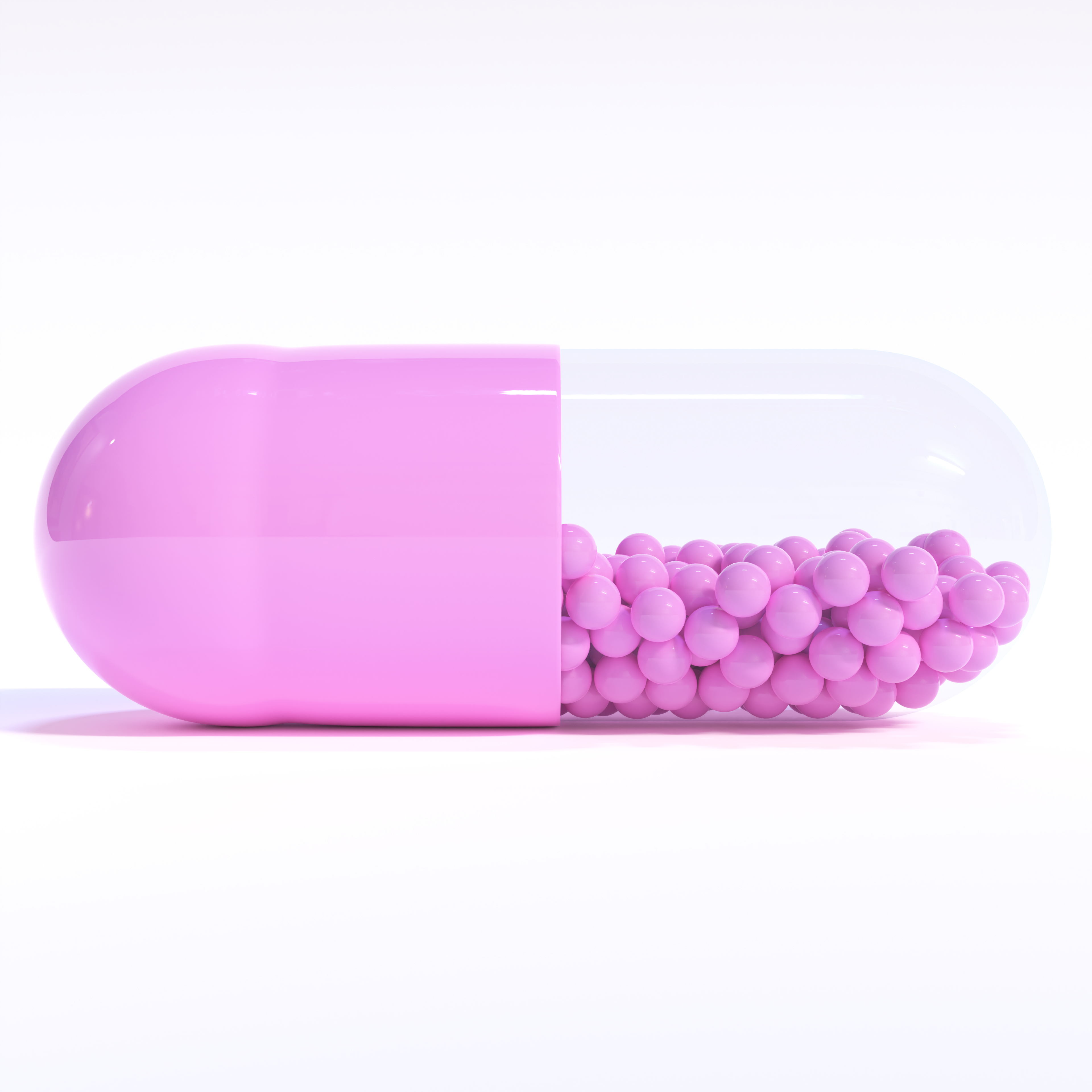 Purple Capsule Full of Granules On White Background