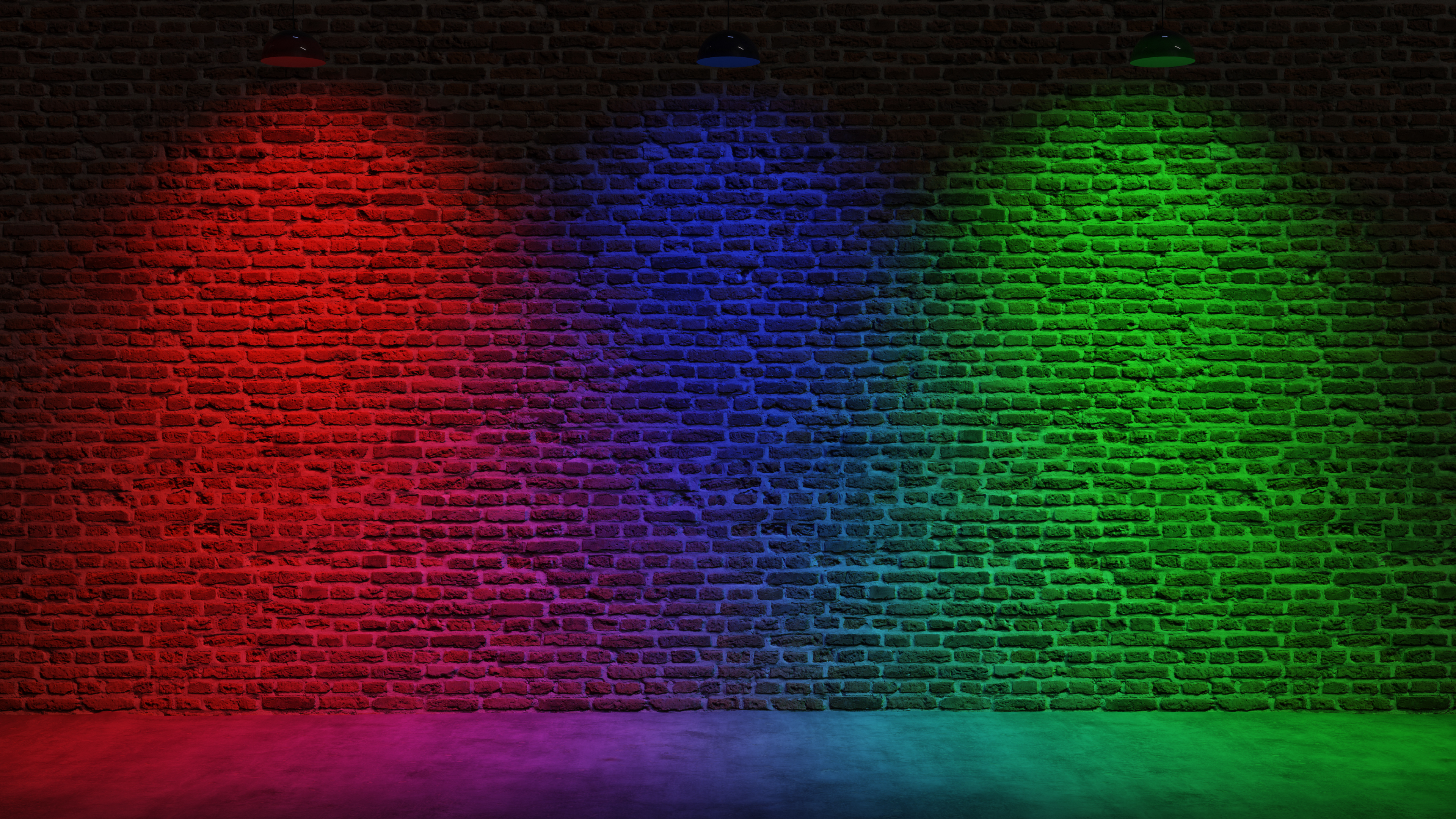 Brown brick wall background with spot lighting effect. REd, Blue, Green