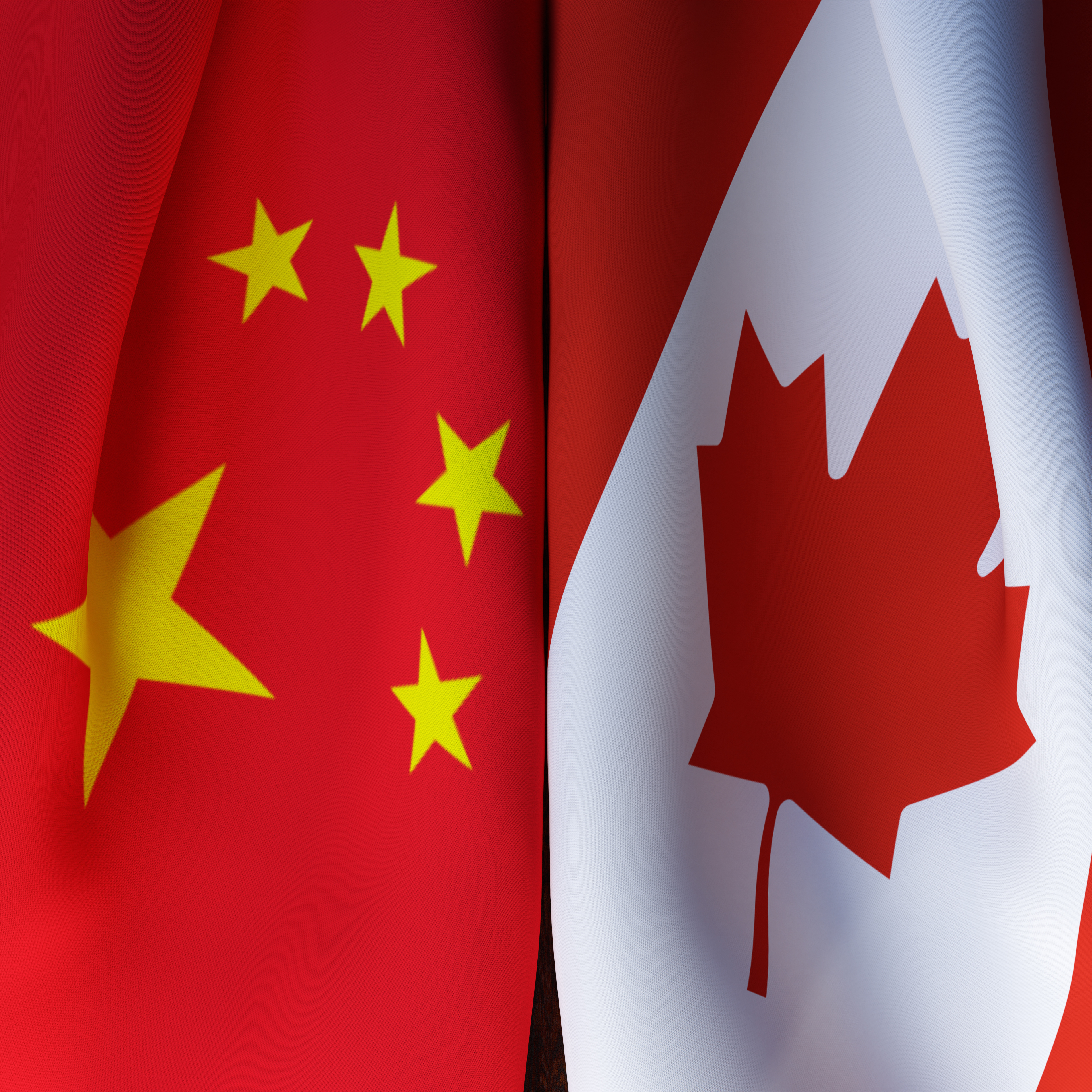 Waving Flags Of China And Canada