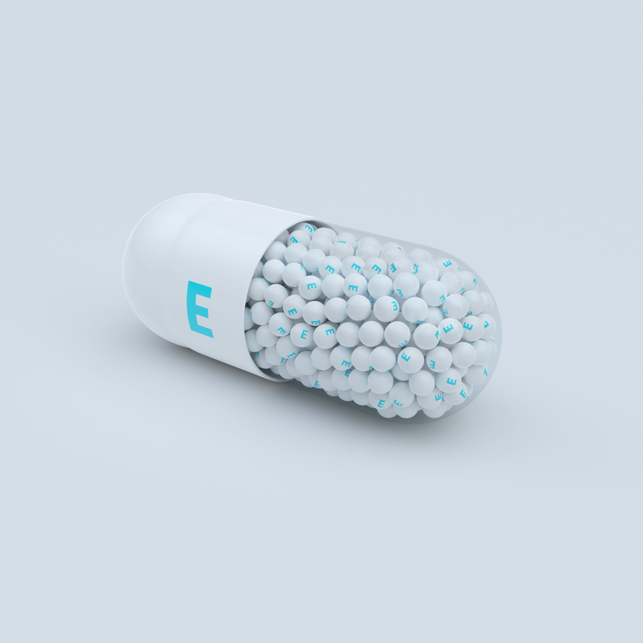 Vitamin E With White Capsules, Granules and White Background