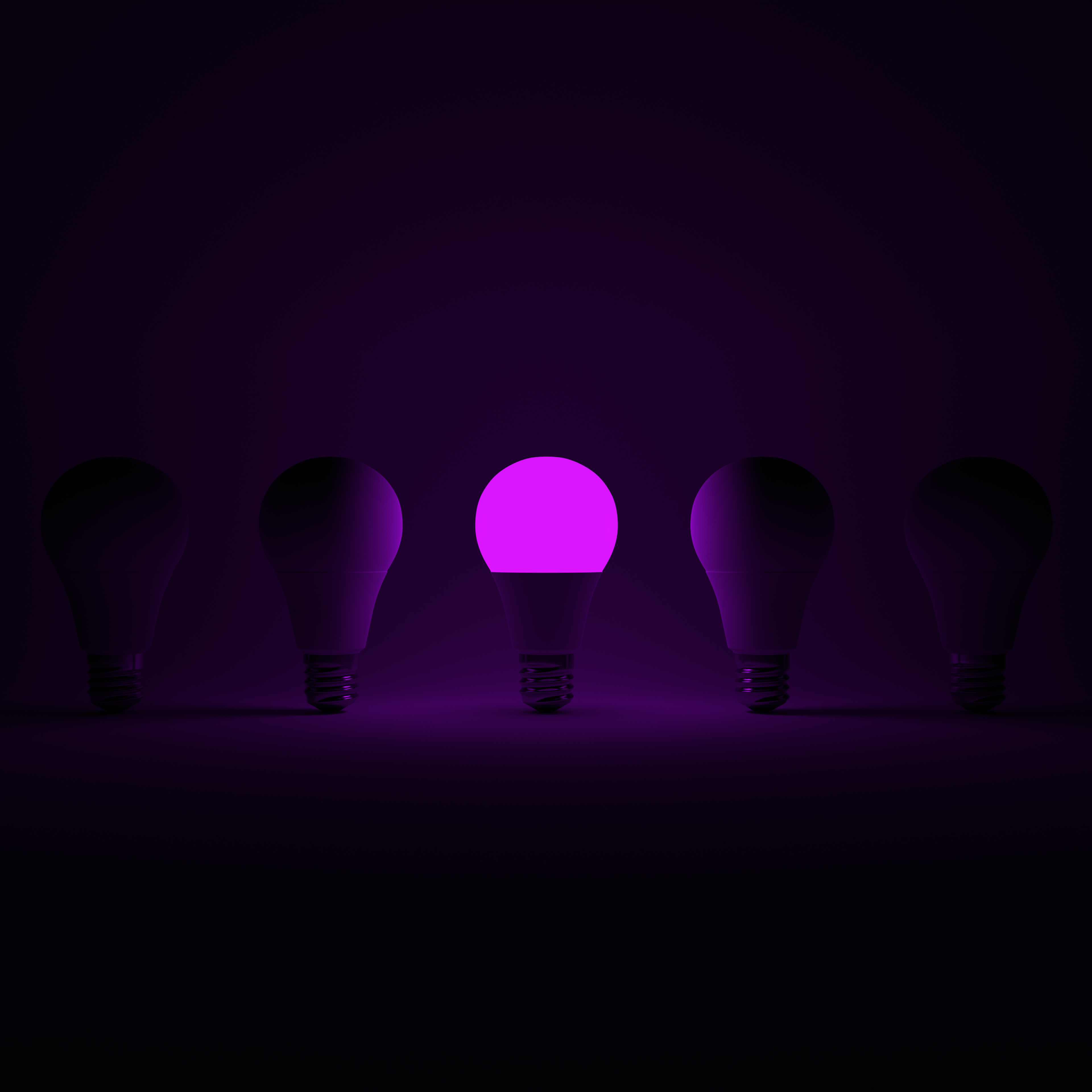 Five Lightbulb and One Glowing Purple Lightbulb with White Background