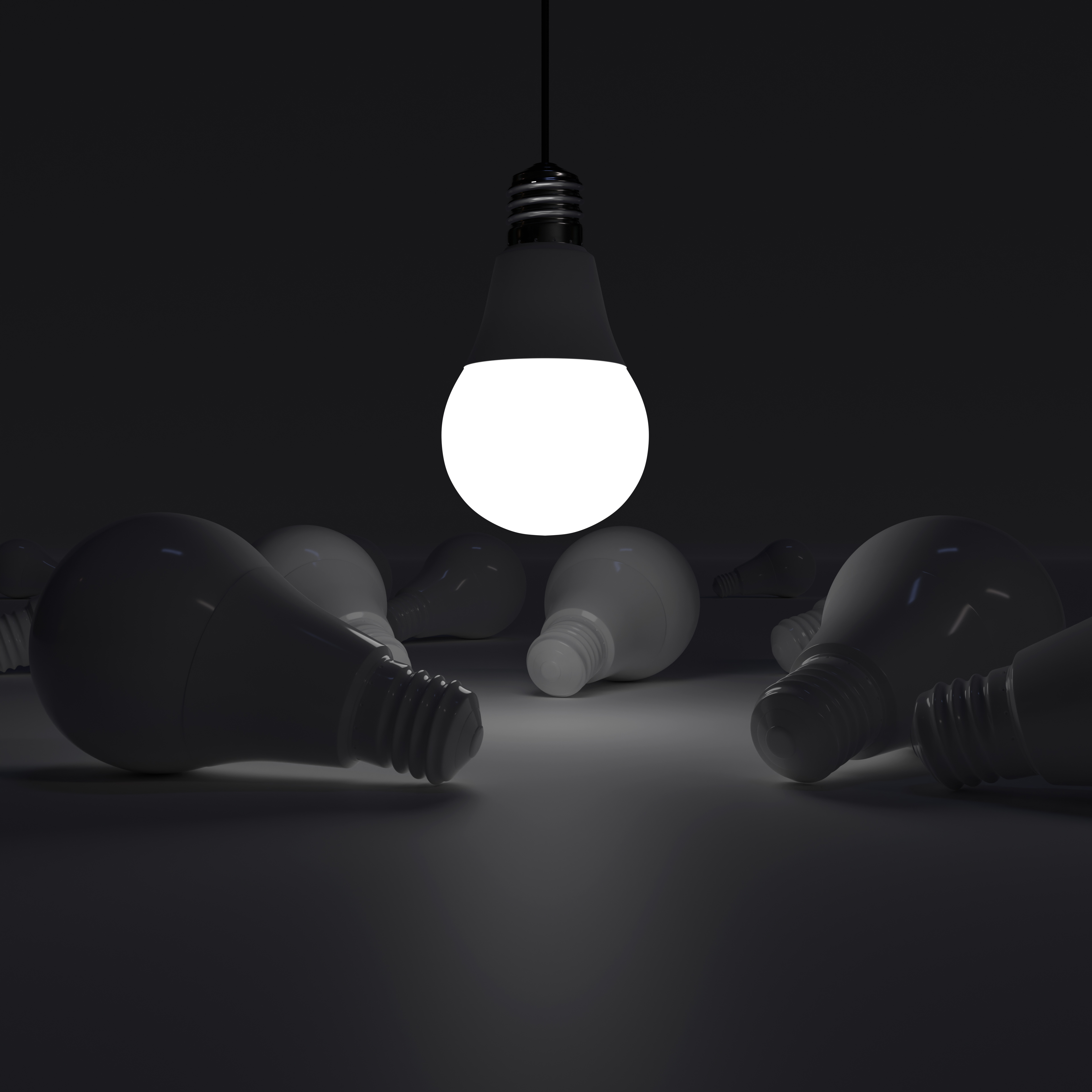One of Lightbulb (upside down) glowing among shutdown light bulb (White)