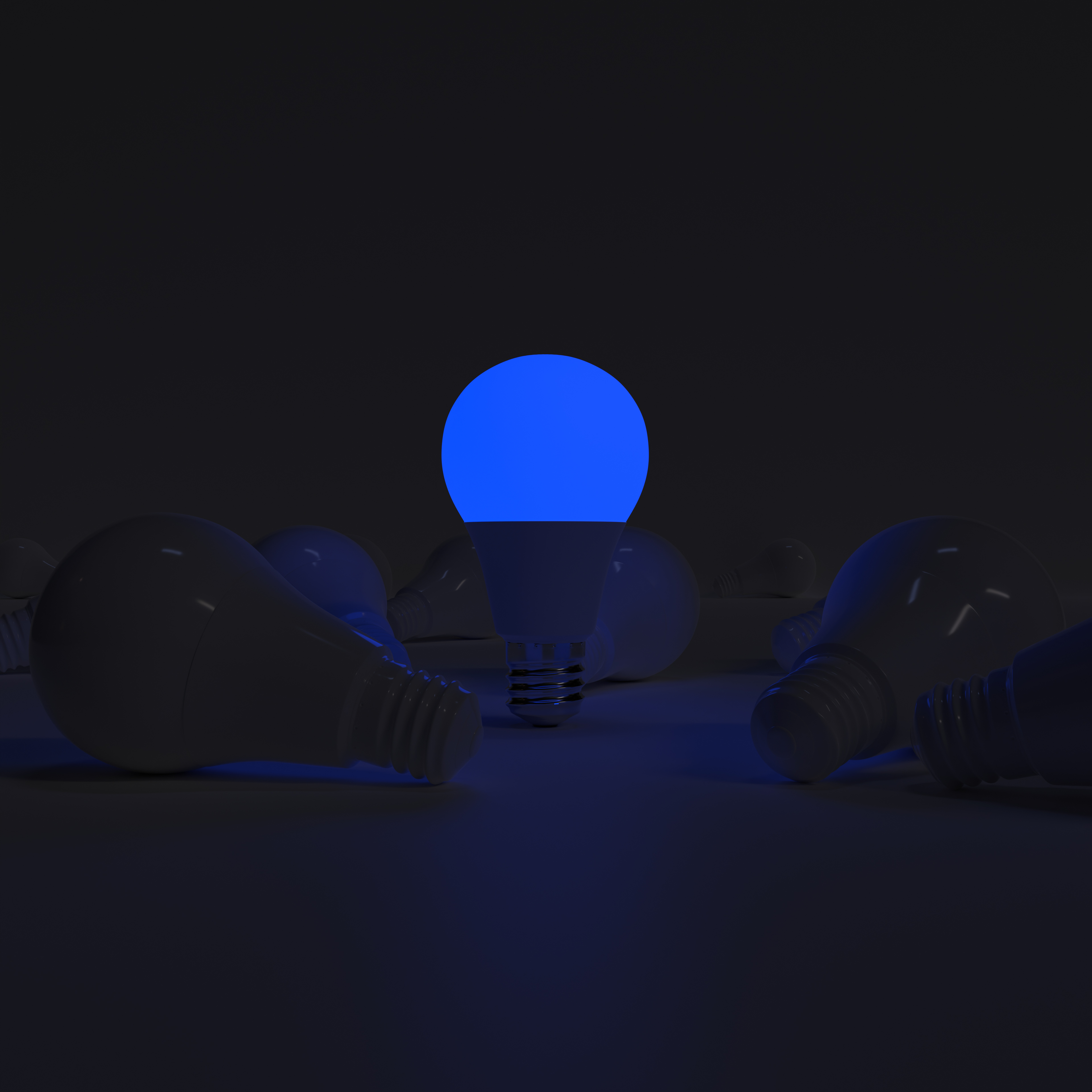 One of Lightbulb glowing among shutdown light bulb (Blue)