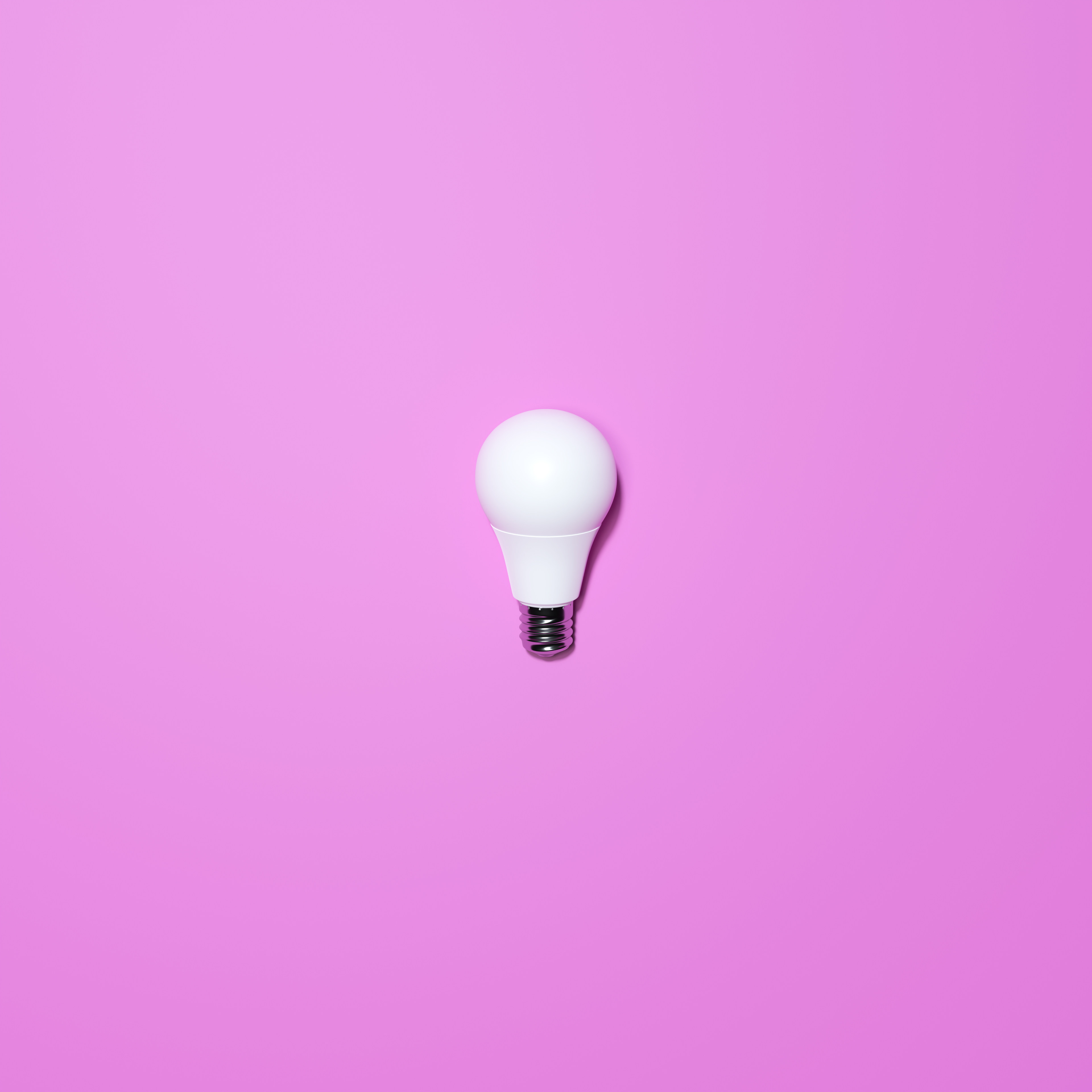 White Lightbulb With Purple Background
