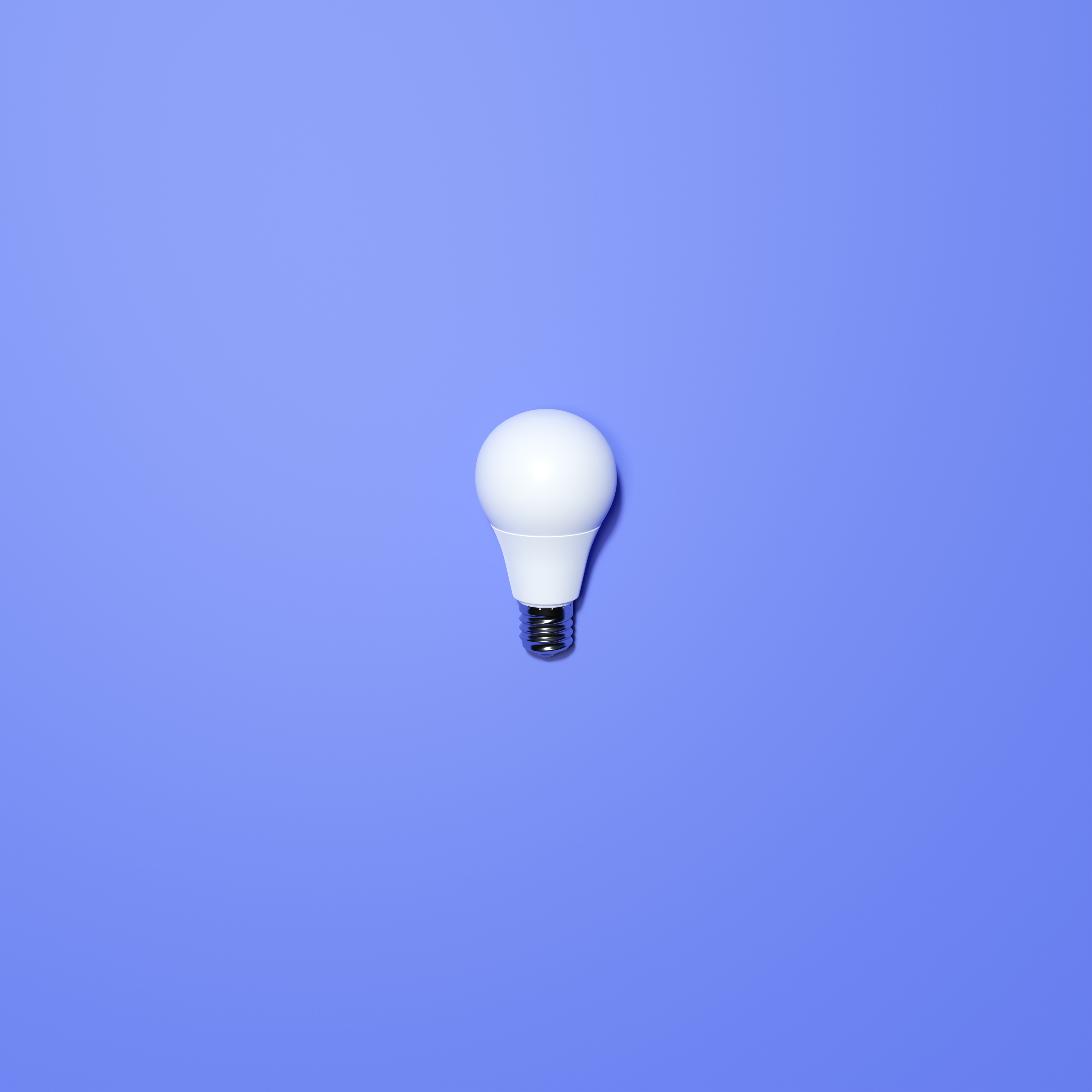 White Lightbulb With Blue Background