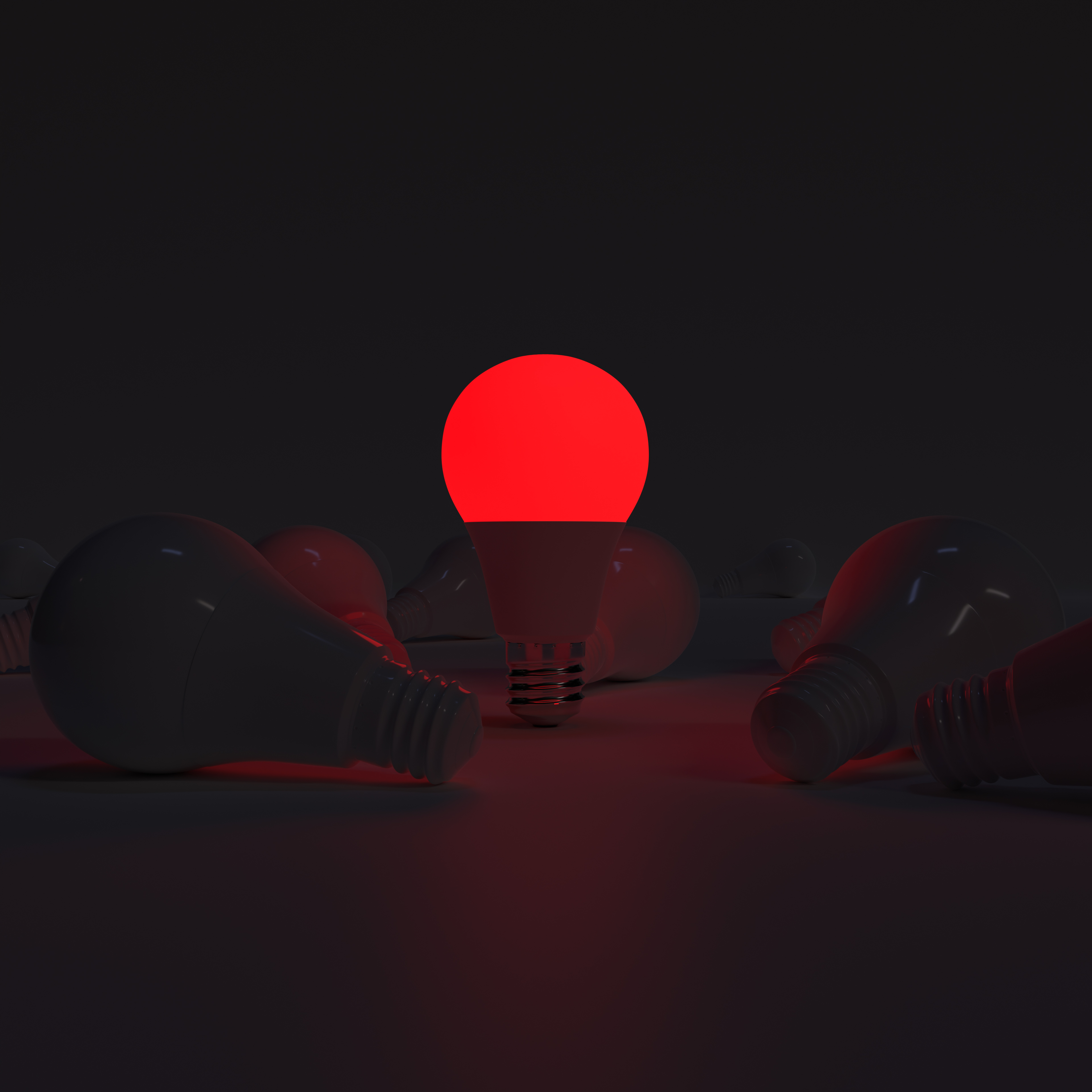 One of Lightbulb glowing among shutdown light bulb (Red)