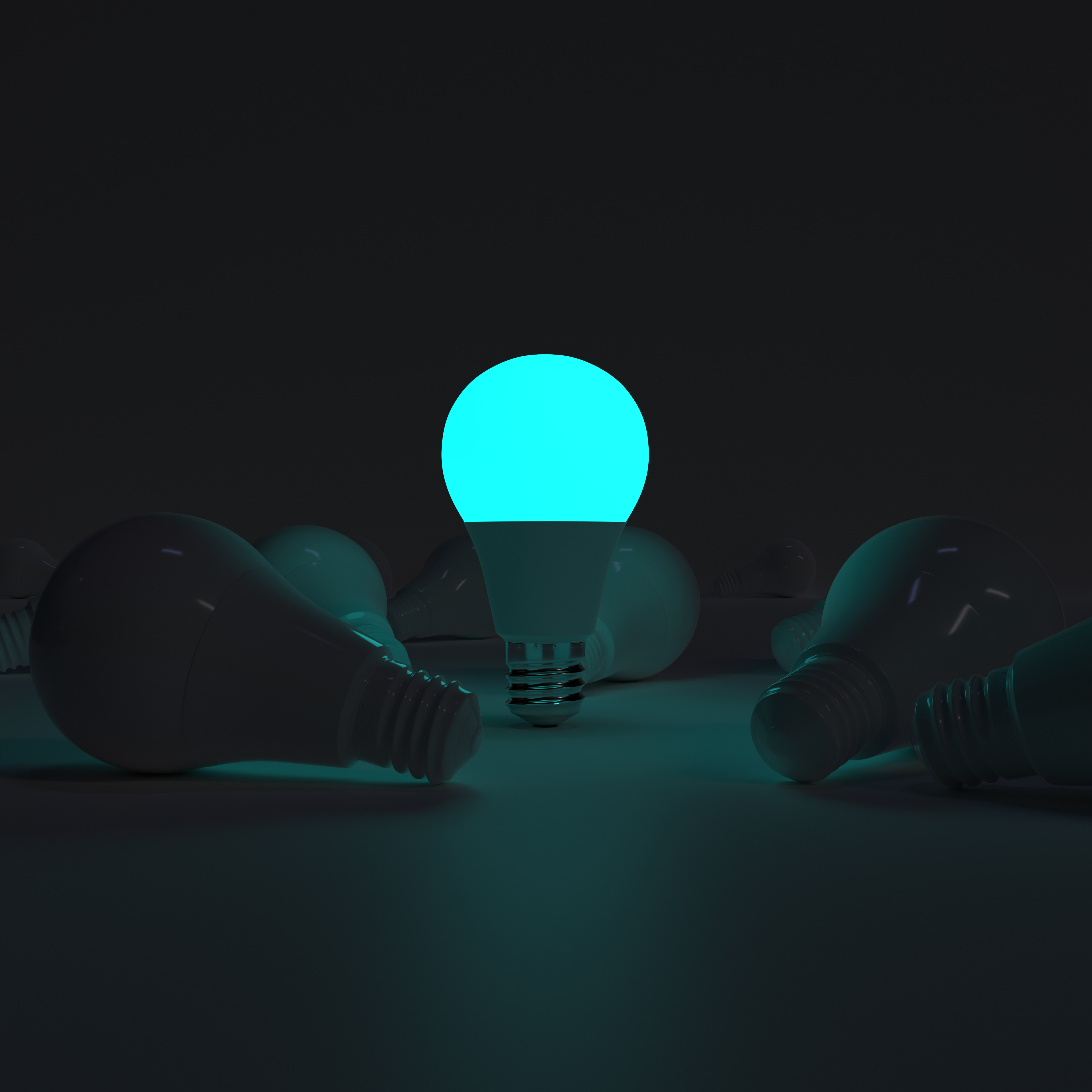 One of Lightbulb glowing among shutdown light bulb(turqoise)