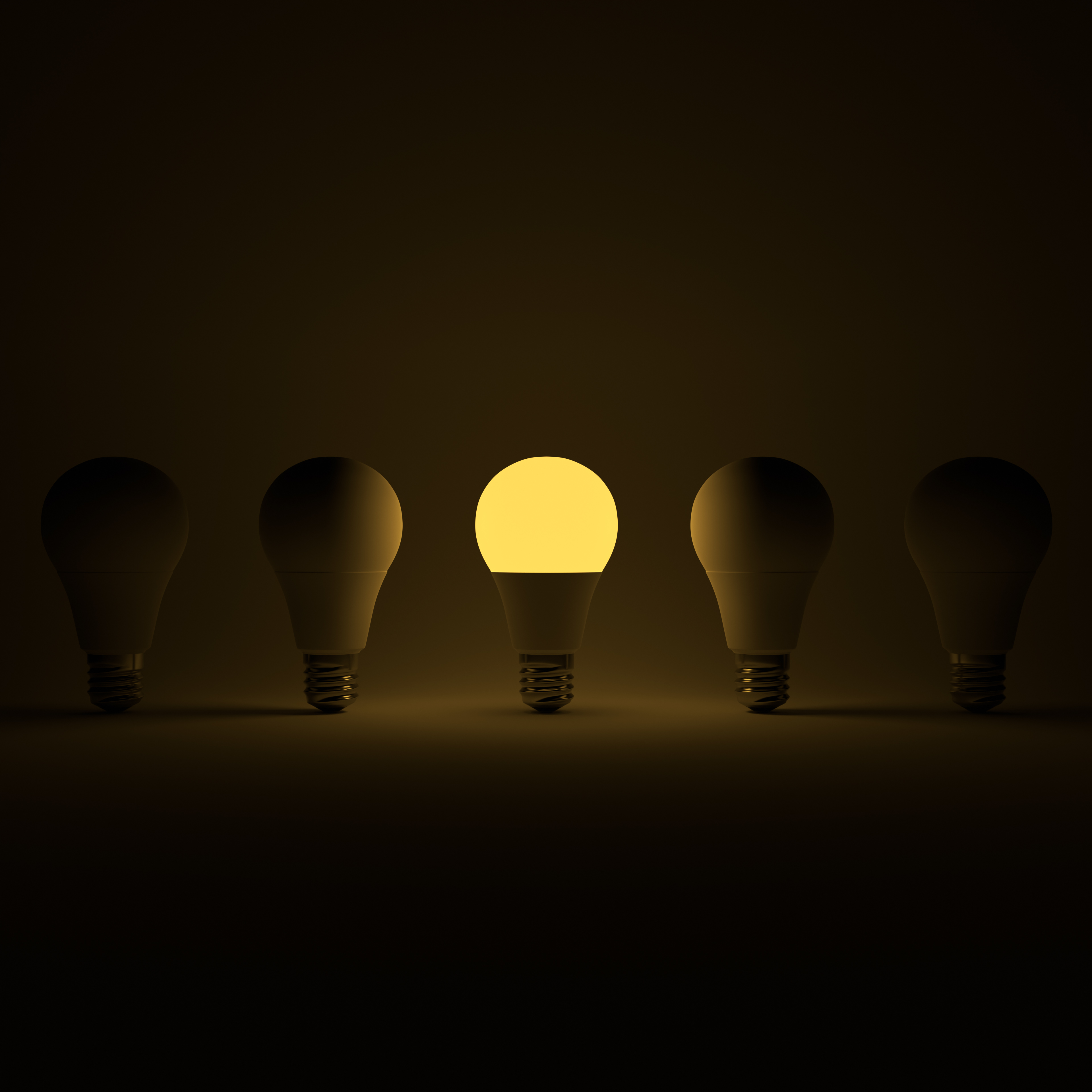 Five Lightbulb and One Glowing Yellow Lightbulb with White Background