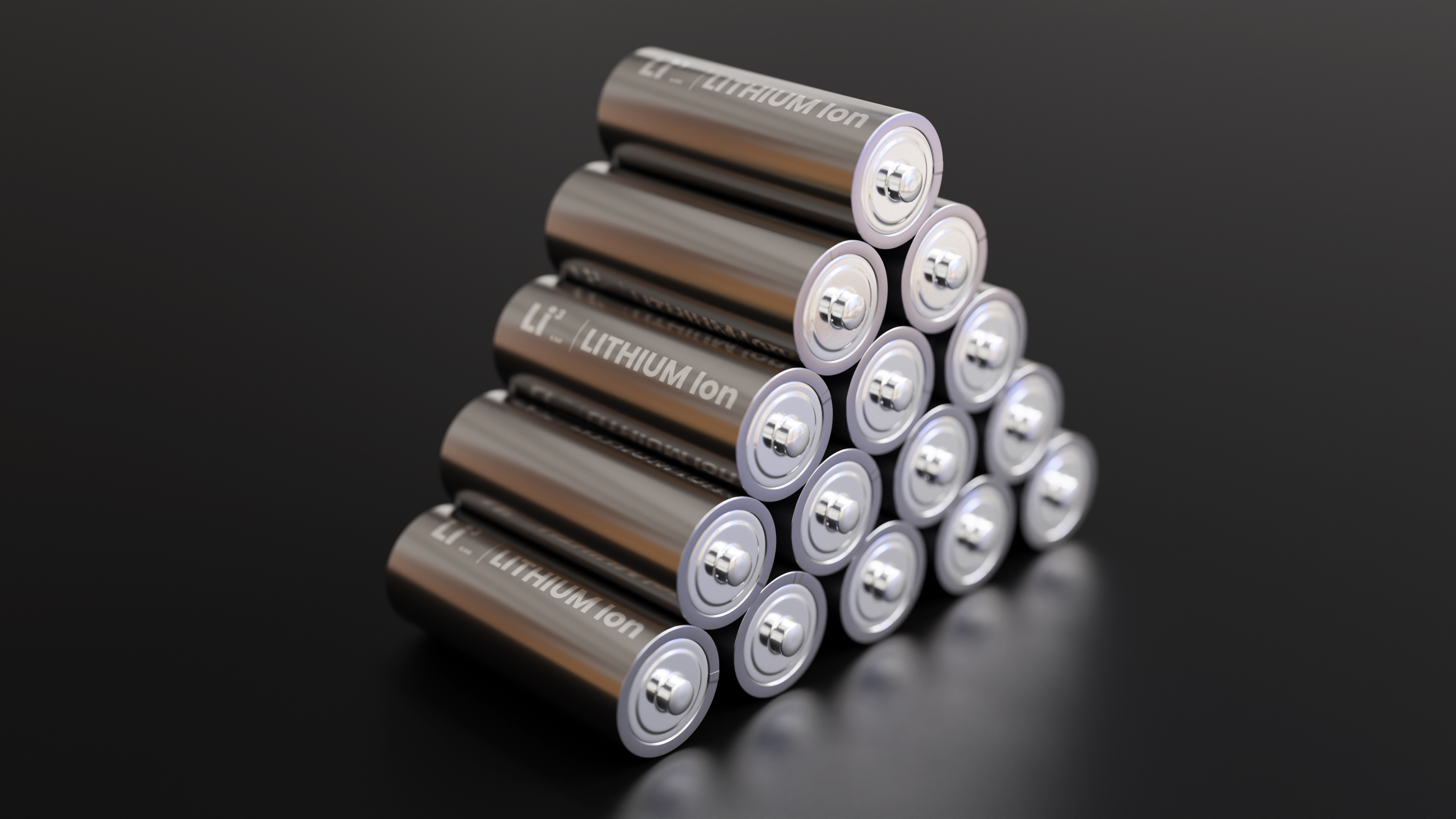 A pile of Lithium Ion batteries with dark background