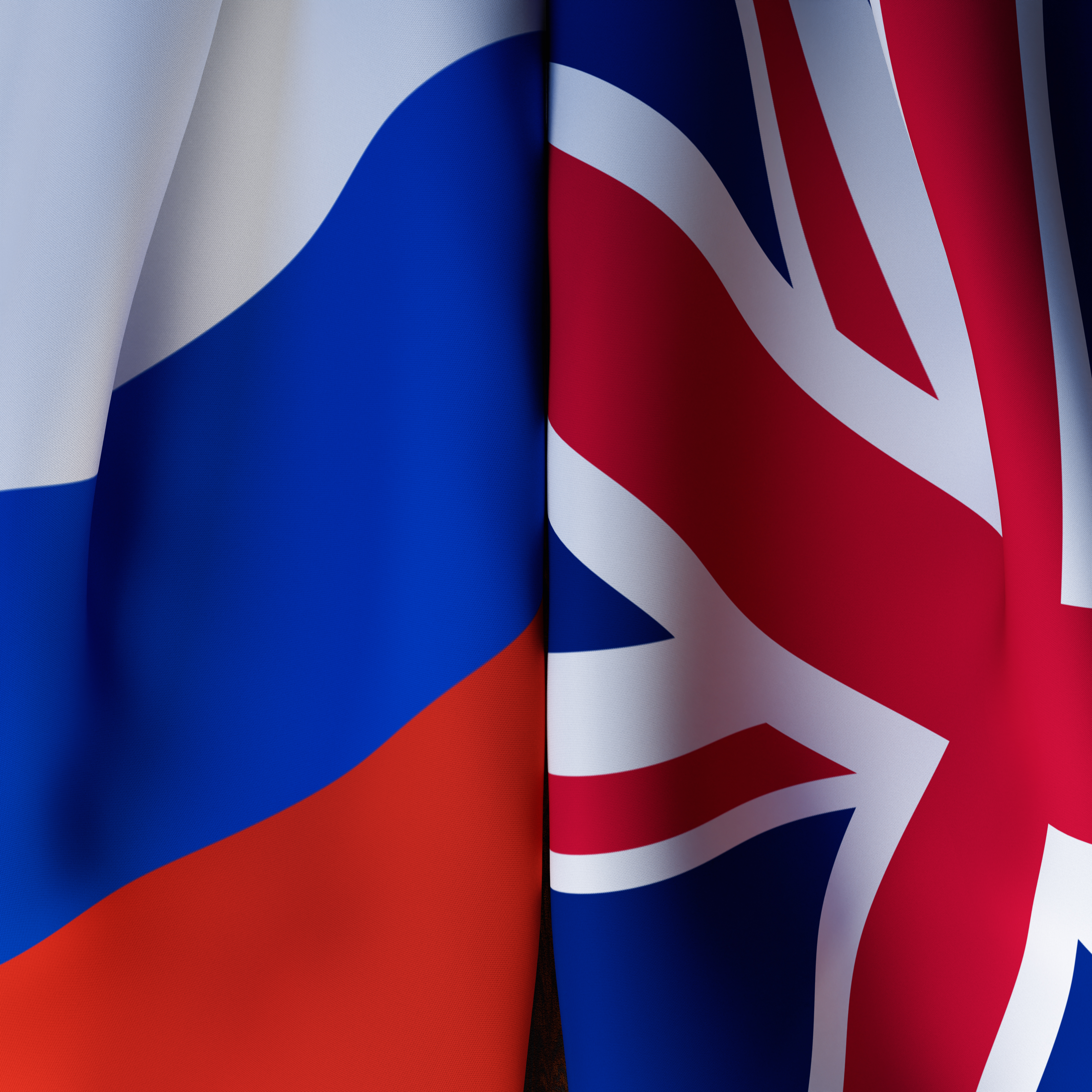 Waving  Flags Of Russia And United Kingdom