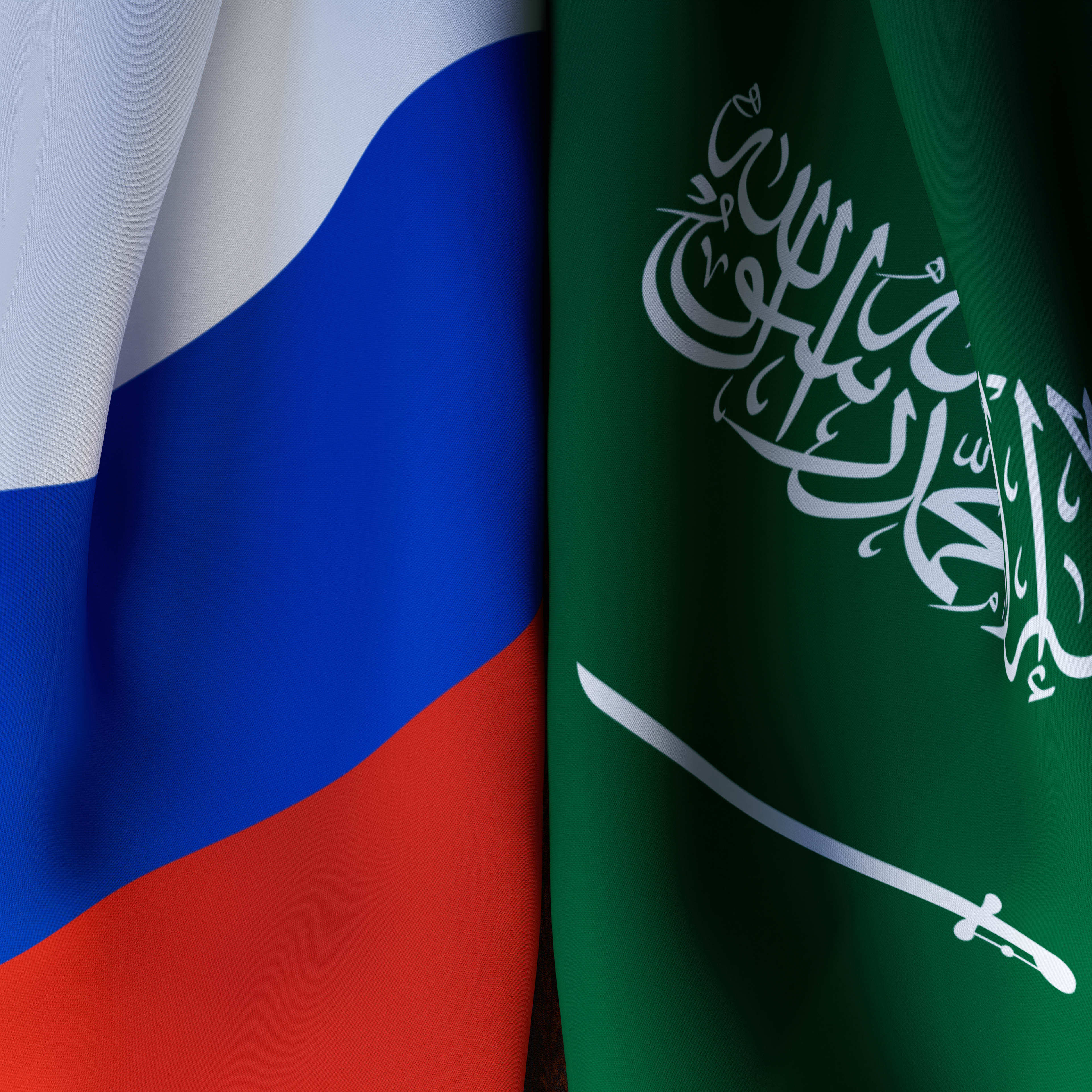 Waving  Flags Of Russia And Saudi Arabia