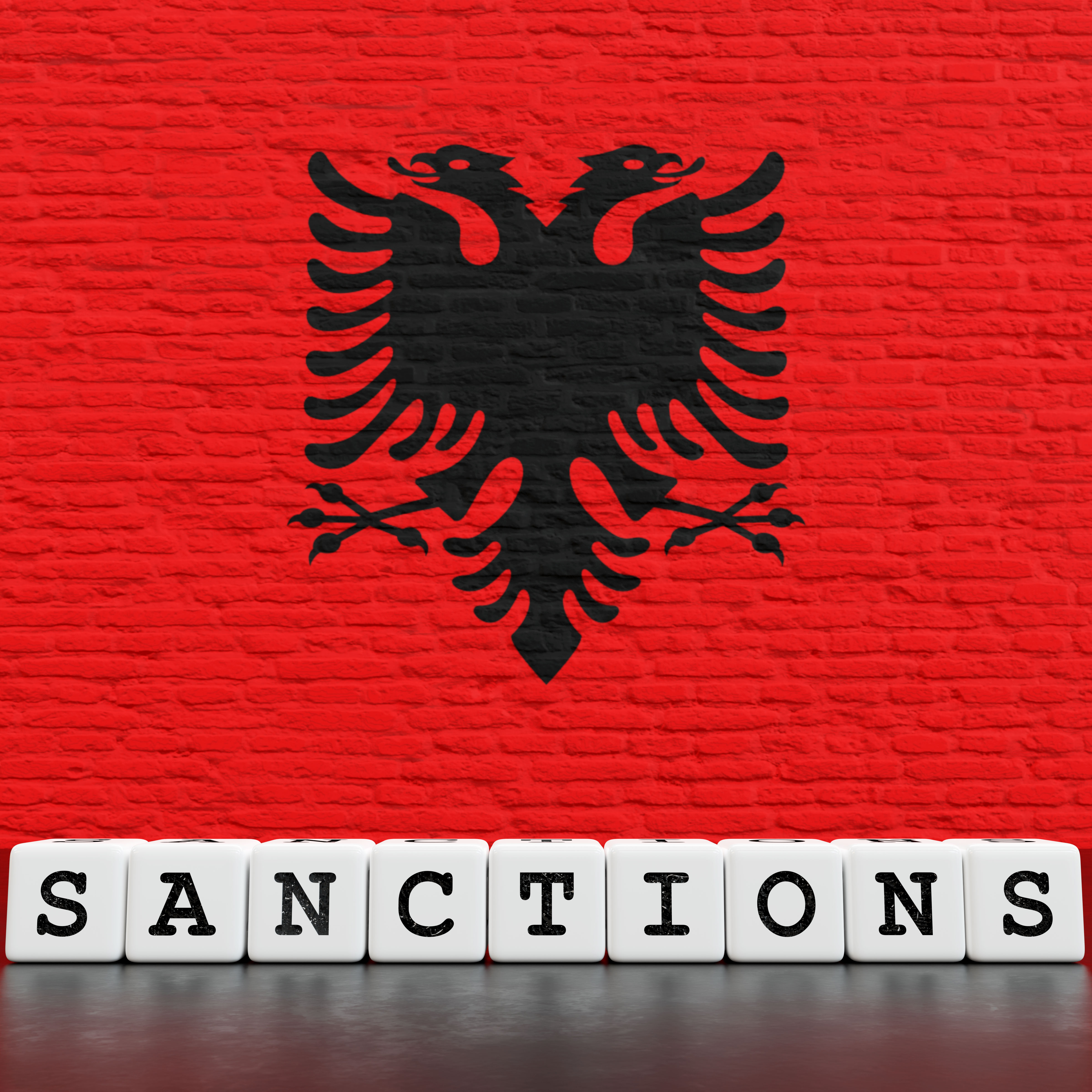 Albania Flag on Bricks Wall With Sanctions